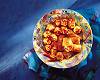 Plate of starters on blue background